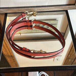 Coach Rust colored crossbody strap with Gold Hardware
